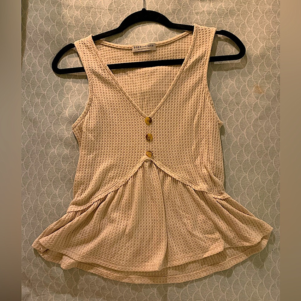 Blush-creamy-pink sleeveless peplum top